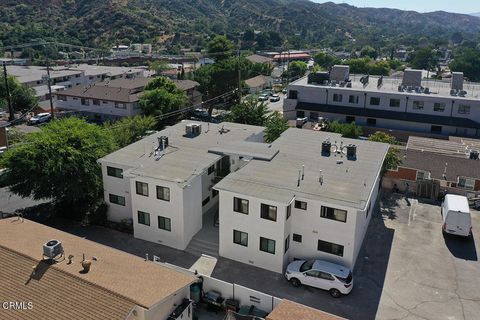 Photo of 7323 Valmont Street, Los Angeles, CA 91042 (MLS # P1-27863)