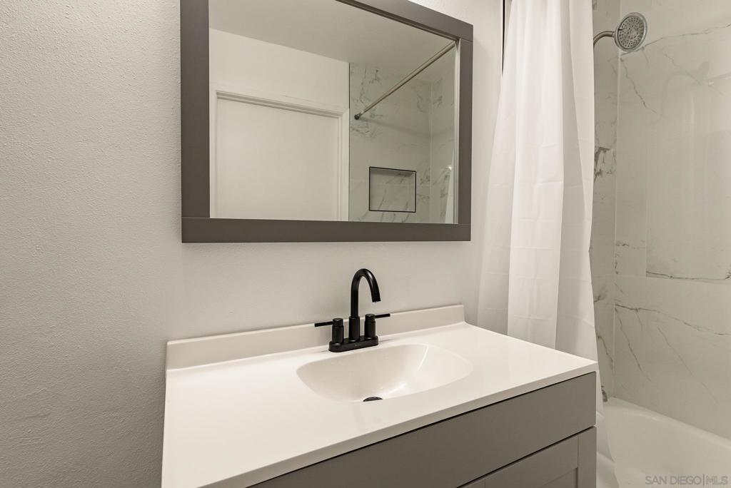 Pets Allowed! OWNER JUST SPENT THOUSANDS OF DOLLARS TO COMPLETE THE NEW LAMINATE AND TILE FLOORING, ALL NEW KITCHEN AND BATHROOM UPGRADED WITH GRANITE COUNTERTOP, NEW APPLIANCES AND FAUCETS, AND MUCH MORE! Condo is located on the ground floor in a Prime Location within the complex! Condo offers a peaceful retreat while being within walking distance of Hourglass Community Park, 5-minute drive to the Marine Base and San Diego Miramar College. Enjoy convenient access to Freeway 15, Mira Mesa Market Center, and many nearby amenities. The community boasts a sparkling pool, tennis court, and lush green surroundings. Don't miss out on this opportunity! Take a look at the photos of this all freshly painted, lower floor, 1 bedroom to really see the value of what you are getting for your money! A Wall AC unit, Tile flooring in the kitchen and Bathroom, and Laminate flooring in the living room and Bedroom. Yes, you DO NOT PAY for Water! You get 1 covered parking space and walking distance to the Washer and Dryer facility. You also have access to the community pool, spa, tennis court.