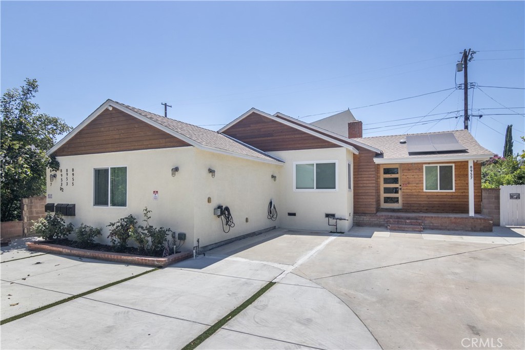 Welcome to this beautifully updated home nestled on a picturesque tree-lined street in the heart of Northridge. Extensively remodeled in 2021, this charming residence offers 3 spacious bedrooms and 2 stylishly updated bathrooms, including a private ensuite in the primary bedroom. Enjoy cooking and entertaining in the thoughtfully designed kitchen featuring modern finishes, ample cabinetry, and sleek countertops. Gorgeous wood floors flow throughout the home, completing the bright and airy layout. This home truly has it all with newer HVAC systems, updated plumbing and electrical, dual-pane windows, tankless water heaters, recessed lighting, durable flooring, EV charging, newer sewer and water lines, fresh interior and exterior paint, and more. The backyard is a peaceful, private retreat perfect for relaxing or hosting intimate gatherings. Ideally located just minutes from CSUN, Northridge Mall, Westfield Topanga & The Village, Warner Center, top-rated schools, hiking trails, and countless shopping and dining destinations including Trader Joes, Costco, and Target.