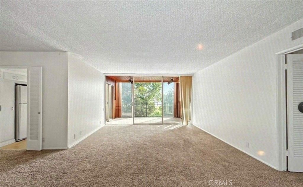 Photo of 289 S Barrington Avenue #A311, Los Angeles, CA 90049 (MLS # SB26078249)