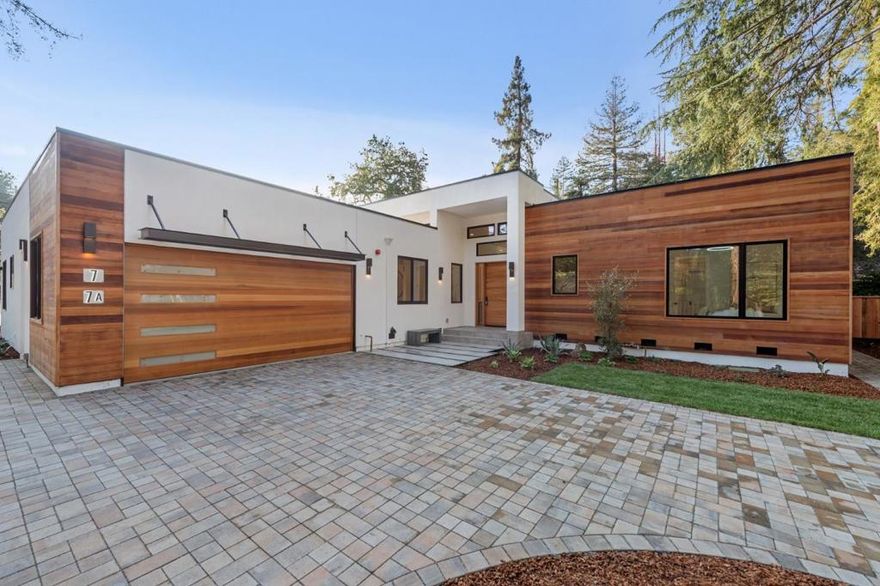 Located at the end of an Atherton cul de sac, this stunning brand new modern home offers one level living, an open floor plan and soaring ceilings. Capturing the true essence of California living, the incredible kitchen-family great room with accordion doors seamlessly connects to the rear grounds featuring an outdoor kitchen, gas fire pit, entertaining pergola, expansive lawn and mature trees. In addition to the 5 bed (plus office), 4.5 bath main residence, the home includes a separate 2 bed, 1 bath accessory dwelling unit (ADU) with a full kitchen and laundry facilities. Walk to the new Atherton Town Center and Holbrook Palmer Park.