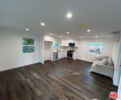 Photo of 7729 Wynne Avenue, Reseda, CA 91335 (MLS # 25612993) Photo of 7729 Wynne Avenue, Reseda, CA 91335 (MLS # 25612993)