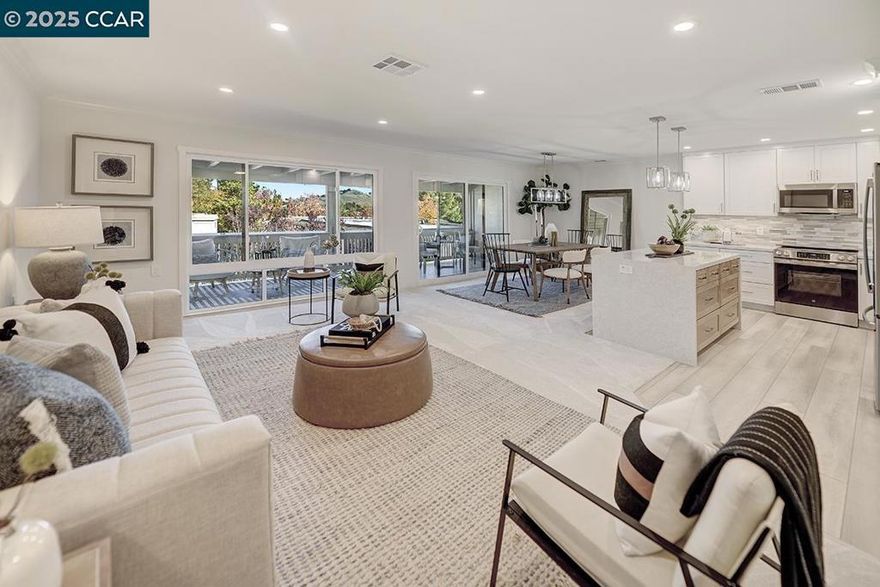 Experience the perfect blend of style, comfort, and serenity in this beautifully remodeled Sequoia model, ideally located at the end of a quiet court on Canyonwood with stunning views of open space and lush greenery. Every inch of this home has been thoughtfully redesigned—from the sleek kitchen featuring solid stone counters, a dramatic waterfall island, custom cabinetry, and stainless steel appliances, to the spa-inspired bathroom with elegant finishes, a seamless glass shower, and a full-size washer and dryer. Sunlight pours through new dual-pane windows and skylights, highlighting the luxury vinyl plank flooring, crown molding, and designer touches throughout. With a convenient carport just steps away and an unbeatable setting that feels worlds away yet close to everything, this home is truly a showstopper—modern living at its very best!