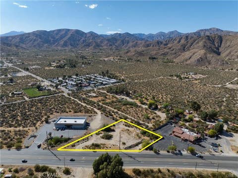 Photo of 50024 Twentynine Palms Highway, Morongo Valley, CA 92256 (MLS # JT26107888)