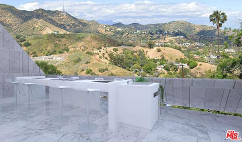 Photo of 6911 Cahuenga Park Trail, Los Angeles, CA 90068 (MLS # 26852837)