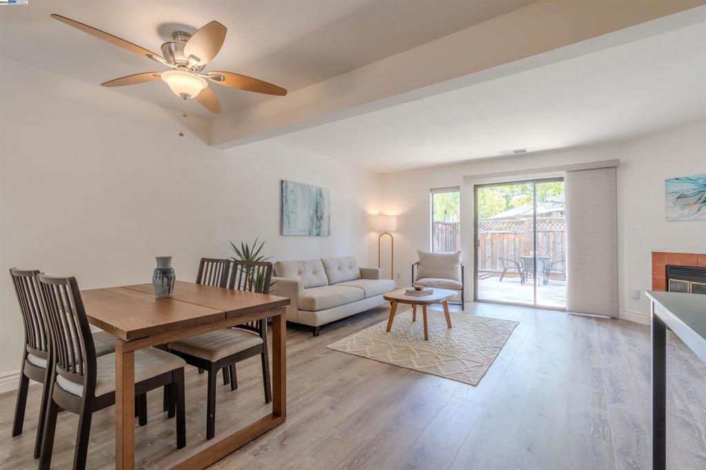 Welcome to 1785 Paseo Laguna Seco- a 2 bed 1.5 bath condo, located in the heart of Livermore. This home features a perfect blend of comfort and convenience, located next to a lush greenbelt, offering a sense of openness and tranquility. Upon entering, the first floor features a newly updated half bath and kitchen, new vinyl flooring, and a living area with a cozy fireplace. A spacious patio area offers a place to relax, or host family and friends. The second level features the primary bedroom with its own private balcony, a second bedroom, a remodeled full bathroom, lots of closet space, and in unit laundry. Other recent upgrades include a newer roof, water heater, air conditioning and furnace. Residents can enjoy some of the many amenities this community has to offer, such as a swimming pool, tennis and basketball courts, and park. Close to downtown and many of the amazing restaurants that Livermore has to offer, wineries, as well as easy freeway access.