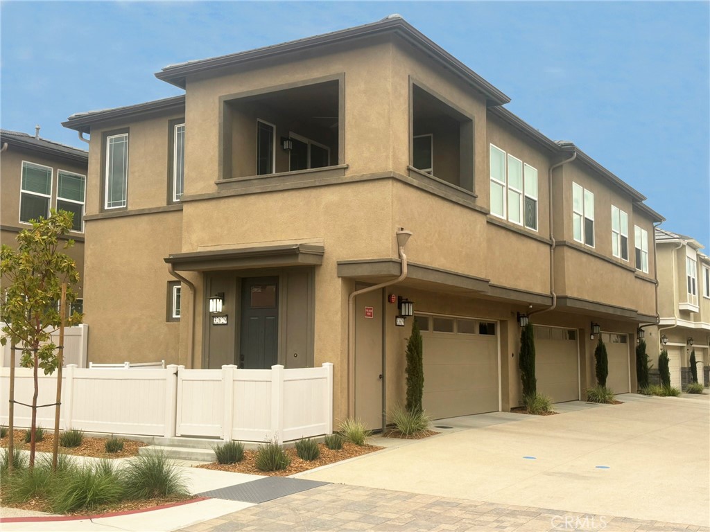 Welcome to this stunning and meticulously maintained townhome located in Sommers Bend, Temecula’s most sought-after community. Built in 2023 and boasting over $50,000 in upgrades, this modern home is move-in ready and offers the perfect blend of style, comfort, and functionality. Step inside to discover custom window shades, elegant two-tone designer paint, and a custom built-in desk in one of the bedrooms—ideal for a home office or study space. The chef-inspired kitchen is beautifully appointed with granite countertops, pendant lighting, crisp white cabinetry, and a spacious walk-in pantry. The primary suite features a generous walk-in closet and a large step-in shower, creating a spa-like retreat. Ceiling fans in all three bedrooms, the living room, and the balcony provide year-round comfort, while the laundry room includes a deep utility sink for added convenience. Additional premium upgrades include luxury vinyl plank flooring, stylish tile floors, a water softener, electric fireplace, tankless water heater, a water filtration system, and custom closet shelving. Sommers Bend delivers true resort-style living with access to three sparkling pools, a hot tub, state-of-the-art fitness center, a stunning clubhouse, and over 8 miles of scenic walking and biking trails. Located just minutes from Temecula Wine Country, Pechanga Resort Casino, and Old Town Temecula, this home is perfectly positioned for both relaxation and entertainment. Don’t miss your opportunity to own a beautifully upgraded home in one of Temecula’s premier communities!