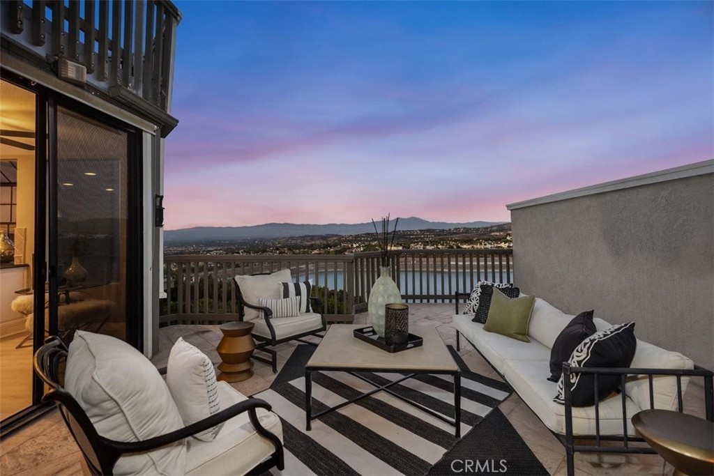 Enjoy One of the Best Locations for the Harbor Ridge Crest Association! Experience ultimate luxury and spectacular, unobstructed panoramic views of city lights, mountains and reservoir in this gorgeous 3-Bedrooms, 2.5-Baths with den or office elegantly renovated and upgraded residence encompassed in the prestigious guard gated community of Harbor Ridge in approximately 2500 square feet of dream living space. Wonderful open, bright floor plan is displayed by wall to wall windows upon entry and 2 balconies or decks illuminating the breathtaking views. Beautifully designed with Marble flooring in entry, New luxury laminate flooring throughout except stairway that entails a soft colored carpet that richly blends with the chic decorative style. All bathrooms and kitchen contain New stylish white Euro-Style Cabinets with granite kitchen counter tops that blend perfectly with the posh like color and tranquil design of the backsplash with Newer stainless steel appliances. All bathrooms embody New modern LED Mirrors perfectly encompassing technology with upscale class. There are 2 built in bars with granite counter tops, glass shelving and mirrors representing a cool retro-like serenity when entertaining or enjoying life to the fullest at the residence. The generously sized bedrooms, including a primary master bedroom provide comfort and privacy while 1 of the 2 bedrooms upstairs entails a balcony a bit away from the other rooms of the residence to enjoy a peaceful bliss and a stairway down to the main entrance front gate for those that are adventurous. This Home has it ALL with being located on quiet street and access to premier community amenities unlike others including 4 pools & spas, 3 tennis courts, and 24 hour guard gated security with patrol service. In addition, minutes from world class beaches, abundant retail, exquisite dining and Top-rated schools. Live the ultimate elegance you deserve and make this home yours!