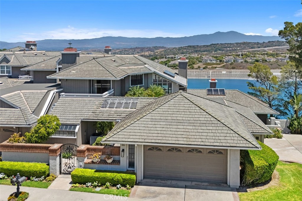 Enjoy One of the Best Locations for the Harbor Ridge Crest Association! Experience ultimate luxury and spectacular, unobstructed panoramic views of city lights, mountains and reservoir in this gorgeous 3-Bedrooms, 2.5-Baths with den or office elegantly renovated and upgraded residence encompassed in the prestigious guard gated community of Harbor Ridge in approximately 2500 square feet of dream living space. Wonderful open, bright floor plan is displayed by wall to wall windows upon entry and 2 balconies or decks illuminating the breathtaking views. Beautifully designed with Marble flooring in entry, New luxury laminate flooring throughout except stairway that entails a soft colored carpet that richly blends with the chic decorative style. All bathrooms and kitchen contain New stylish white Euro-Style Cabinets with granite kitchen counter tops that blend perfectly with the posh like color and tranquil design of the backsplash with Newer stainless steel appliances. All bathrooms embody New modern LED Mirrors perfectly encompassing technology with upscale class. There are 2 built in bars with granite counter tops, glass shelving and mirrors representing a cool retro-like serenity when entertaining or enjoying life to the fullest at the residence. The generously sized bedrooms, including a primary master bedroom provide comfort and privacy while 1 of the 2 bedrooms upstairs entails a balcony a bit away from the other rooms of the residence to enjoy a peaceful bliss and a stairway down to the main entrance front gate for those that are adventurous. This Home has it ALL with being located on quiet street and access to premier community amenities unlike others including 4 pools & spas, 3 tennis courts, and 24 hour guard gated security with patrol service. In addition, minutes from world class beaches, abundant retail, exquisite dining and Top-rated schools. Live the ultimate elegance you deserve and make this home yours!