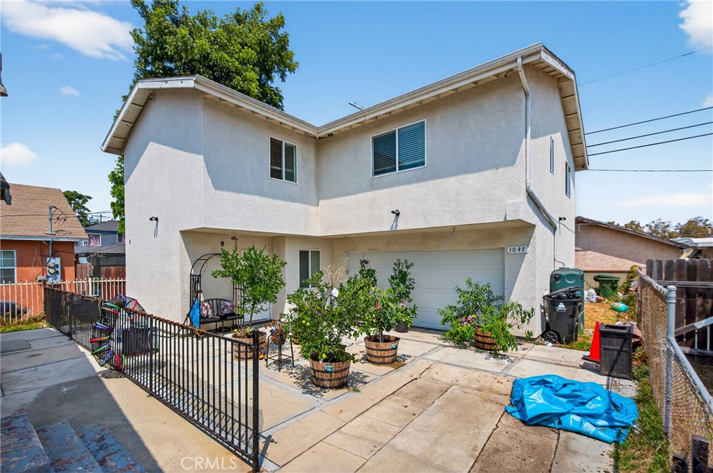 IKON Properties is pleased to present this great investment opportunity in the heart of Los Angeles, a unique duplex configuration consisting of two fully detached single family homes situated on a single parcel. This offering is ideal for investors seeking stable rental income or owner users looking to offset
occupancy costs with supplemental income. The front structure is a well maintained 3-bedroom, 2-bath residence offering generous interior space and functional layout, suitable for family tenancy. The rear unit is a newly constructed 4-bedroom, 2.5-bath home featuring a modern open floor plan,
luxury finishes, and energy efficient systems. Both units are separately metered and offer dedicated private yards, in unit laundry, and ample parking. This is a rare find, a duplex that feels like two single family homes with separate entries, privacy, and high end finishes throughout. Whether you’re looking to grow your portfolio or accommodate extended family, this property offers the versatility and value rarely found in today's market.