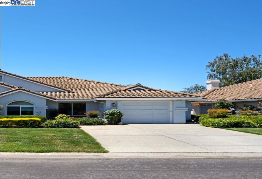 55+ gated Senior Community. This single-story home with 1148 sqft of living area on a premium 3528 sqft lots features 2 spacious bedrooms, 1.5 bathrooms and a spacious living room with a fireplace. The community offers its residents access to numerous amenities including a community clubhouse and pool. Recent upgrades include new interior paint and new flooring. The kitchen is equipped with a refrigerator and enough storage space with the convenience of an in-unit washer and dryer. A private backyard is an ideal spot for relaxation or outdoor entertainment. This property is located directly across from a community park which offers an additional space for refreshments. Close to shopping centers, dining options, recreational parks, hiking trails, golf courses and more. If you're looking for peace at home or adventure in your surroundings, this home offers you both. Don't miss it!