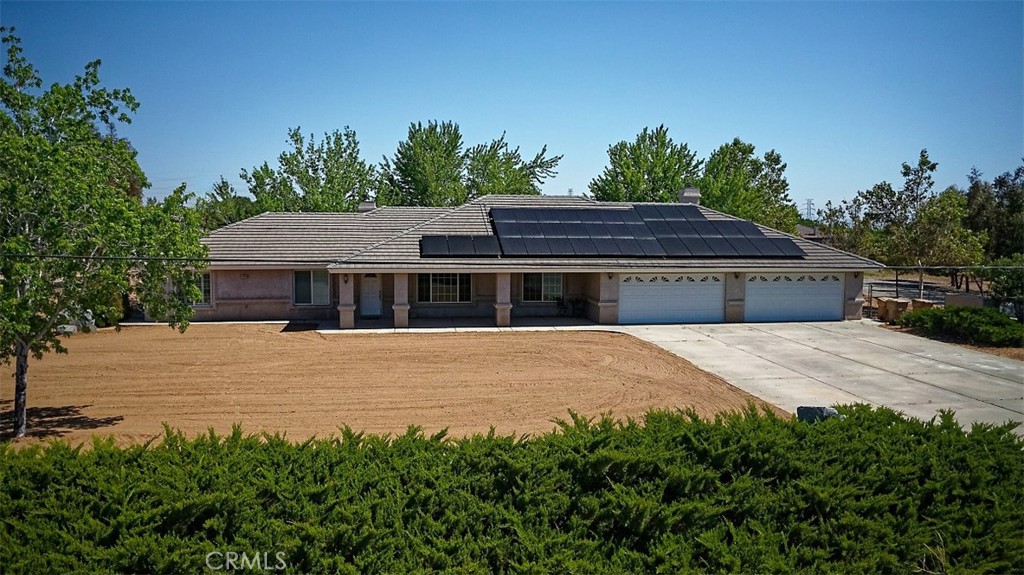 **High Desert Living at Its Best!** Back on market buyer didn't qualify
Welcome to this stunning 4-bed, 3-bath East Oak Hills home sitting on 2.2 fully usable acres—***WORK SHOP*** and perfect for off-road enthusiasts, animal lovers, and those seeking wide open space yet easy access to I-15 FRWY. With 2,766 sq ft of living space, enjoy a desirable split floor plan featuring *two* master bedrooms, including a dreamy primary suite with fireplace, and a beautifully remodeled bath. The heart of the home is a large family room accentuated with a cozy wood stove, opening to a huge covered patio and lush, landscaped backyard. The kitchen boasts a wraparound granite bar, barn-door pantry, and open-concept flow ideal for entertaining. Durable wood-look porcelain tile throughout. Enjoy a well-designed laundry/wet room with direct patio and garage access. Includes a finished 4-car garage and an incredible *** 40x40 workshop ***. Built for efficiency and comfort with 2x6 insulated walls, water softener, MasterCool evap system, central A/C, and 31 solar panels . Just minutes from I-15—this home truly has it All !