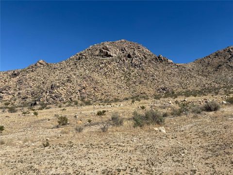 Photo of 0 Holmes, Lucerne Valley, CA 92356 (MLS # HD25111934)