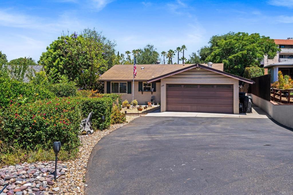 Located near the end of a quiet cul-de-sac, this 2 bedroom, 1 bath home sits on just under a 1/4 acre - imagine adding an ADU or a true primary suite. The long driveway easily accommodates an RV. The property features a variety of mature fruit trees—including citrus, sapote, and pomegranate—that add beauty and shade to the spacious backyard. Enjoy indoor-outdoor living with a newer Trex deck off the living room and two covered outdoor spaces ideal for relaxing or entertaining. Updated kitchen with new dishwasher & granite counters. Plenty of storage options with bonus space under the home and shed. This location is convenient to the 15 freeway and major shopping.