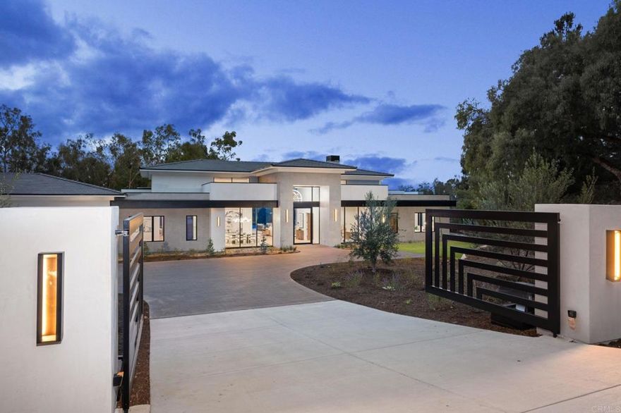 Brand-new 2025 modern single-level estate on 1.13 acres with panoramic views and exceptional privacy on a rare Covenant Island in Rancho Santa Fe. Striking contemporary architecture by Mark Radford and expert construction by Robert Dodds. No HOA, no architectural restrictions, and optional annexation into the Covenant for access to the RSF Golf Club, clubhouse, trails, and social amenities.  The main residence offers 5BD, open-concept living, soaring ceilings, Fleetwood-style doors, European White Oak flooring, custom Shinnoki cabinetry, Premium Perla Venata quartzite, and a chef’s kitchen with Thermador Professional appliances, dual wine columns, and an oversized island.  A separate 939 SF luxury ADU features a full kitchen, living room, 1BD/1.5BA, laundry, and a private entrance—ideal for multigenerational living or guests.  Resort-style outdoor living includes a brand-new zero-edge pool, modern outdoor kitchen, elevated view deck, and gated entry. Additional features include owned solar, Lutron automation, and a home security system with the ability to add cameras or monitoring.  A rare brand-new contemporary estate—single level, private, and irreplaceable.