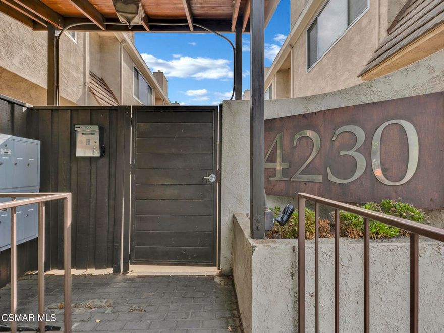 Spectacularly quaint, quiet and charming complexes are rarely found. Step through the gates into the unique and lovely common courtyard. Recently updated and modernized throughout. A cozy fireplace welcomes you to the bright, spacious living room with wood type laminate flooring leading into a sizable, private patio perfect for relaxation, BBQs and entertaining. Remodeled downstairs powder bath with new fixtures, commode, sink. Kitchen features a new range, stone type counters, fixtures, sink, updated and much more. Built in microwave and updated cabinets sparkle.  Kitchen breakfast nook area and plenty of storage. Includes refrigerator.  In-unit laundry includes washer and dryer. Two upstairs primary suites, one with a stately wood beamed ceiling and fan, both ensuite baths are updated with new fixtures, shower glass, stone type counters and much more. Both bedrooms have ample storage and spacious closets.  This is the home you have been searching for! Warm, welcoming and awaiting its new owner!