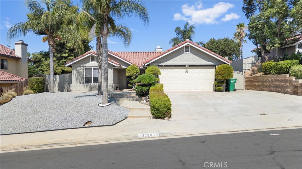 Location, Location, Location Located in one of beautiful neighborhoods in Moreno Valley. This charming beautiful single-story residence is waiting for your fussy client. This beautiful three spacious bedrooms, with two attached car garage with extra wide driveway with very nice landscaping hardwood floors Granite counter tops in kitchen and bath custom tile work in bathroom with nice shower doors, tile flooring patio with cover and a free standing patio with cover. Conveniently located near shopping centers, dining venues, schools, and major freeways, this home truly offers exceptional value and an unbeatable location.