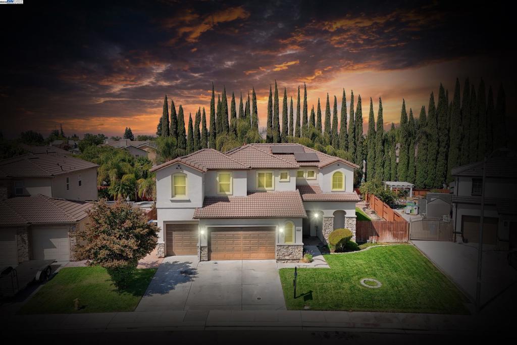 Welcome to this exceptional, move-in ready home in the highly sought-after Northgate neighborhood of Manteca. This beautifully maintained property offers 5 bedrooms and 3.5 bathrooms, ideal for families and entertaining. The spacious, open floor plan is enhanced by vaulted ceilings and abundant natural light, creating an inviting and elegant atmosphere throughout. The chef-inspired kitchen features durable solid countertops, island, ample cabinetry, making meal preparation functional, elegant and enjoyable. Seamlessly transition to the private backyard and patio, perfect for summer gatherings, alfresco dining, or quiet evenings under the stars. Additional highlights include a 3-car attached garage, HVAC, energy-efficient windows, and smart home enhancements, ensuring comfort and convenience year-round. Residents enjoy access to community amenities including nearby parks, walking trails, and recreational areas, while being just minutes from top-rated schools, shopping centers, dining, and easy freeway access. This home offers the perfect balance of tranquility, lifestyle, and connectivity. Don’t miss the opportunity to join this vibrant community