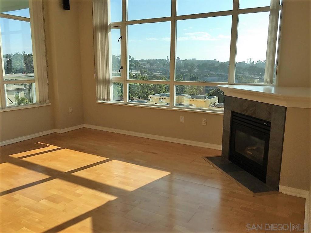 Bright sunny two bedroom, two bath unit in The Discovery on Cortez Hill. This 22 story building offers many amenities including 24 hour concierge services, a business center available for residents use and a 10th floor oasis that includes a swimming pool, fitness room, sauna, barbecues and more. The unit itself has approximately 1250 square feet, with wood floors in the kitchen, living room and dining area. The bedrooms are carpeted (the carpet is less than 2 years old). The unit has split master bedrooms with large baths. The washer and dryer is stacked but full sized and the kitchen has a gas cook top and French-door refrigerator. The cabinetry and flooring is maple and the counters are black granite. The rent includes building wi-fi, two parking spaces in the garage and a small storage area in the garage. Everyone who lives in the Discovery loves it. It is the perfect location, close to downtown, Balboa Park and Hillcrest.