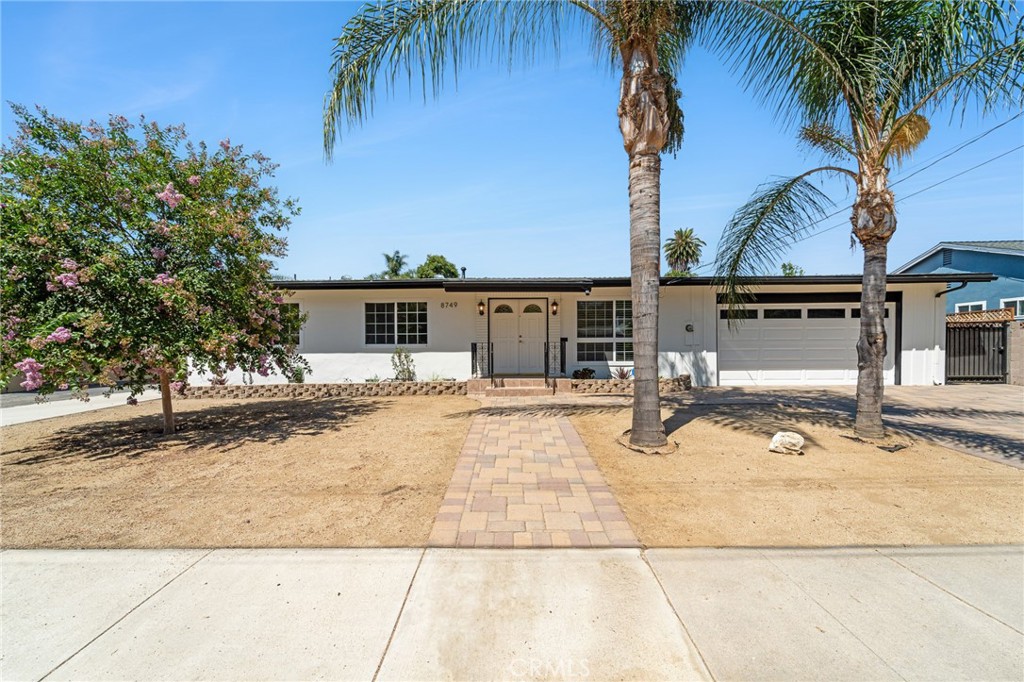 The single level pool home you have been waiting for is here! Tucked away in one of the nicest pockets in North Hills on a quiet cul de sac style street on a nearly 8000 ft. lot. Move in ready, 1400+/- ft floorplan w/3 beds, 2 baths, amazing wood beamed pitched ceilings in LR, KIT and all 3 bedrooms – make this house bright, open and unique. New roof, newer 4 ton AC, oversized 2 car garage, fresh painted inside and out. dining area, large living room w/wood burning fireplace, stainless steel appliances, quartz countertops w/full backsplash, designer cabinets, wine rack, dual paned French style windows throughout, both baths feature stunning tile work. Light colored hardwood style floors and tile throughout, custom track and recessed lighting. The landscaping is impeccable…custom paver driveway, drought resistant softscape showcased by palm trees and fresh flower beds. Private Back yard is ready for party time! Giant swimmers pool w/diving board, covered patio and a large play area with pavers and fruit trees make the perfect setting for tables, chairs, chaises and room for a ping pong table. Permit granted for a 1000 sq ft. ADU too!! Not a flip, current owner has lovingly cared for and lived in the property for years.