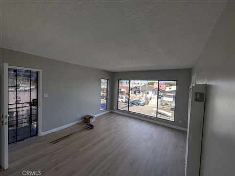 Photo of 5847 Denver Ave, Los Angeles, CA 90044 (MLS # AR26083034)