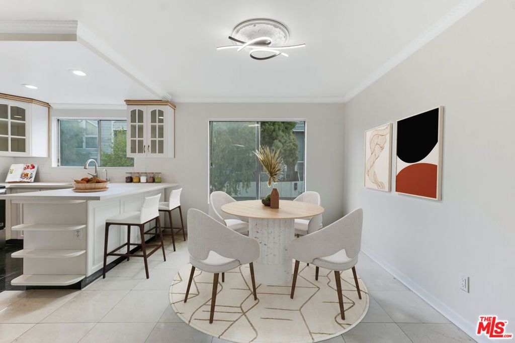 Photo of 18316 Hatteras Street #21, Tarzana, CA 91356 (MLS # 26730443)