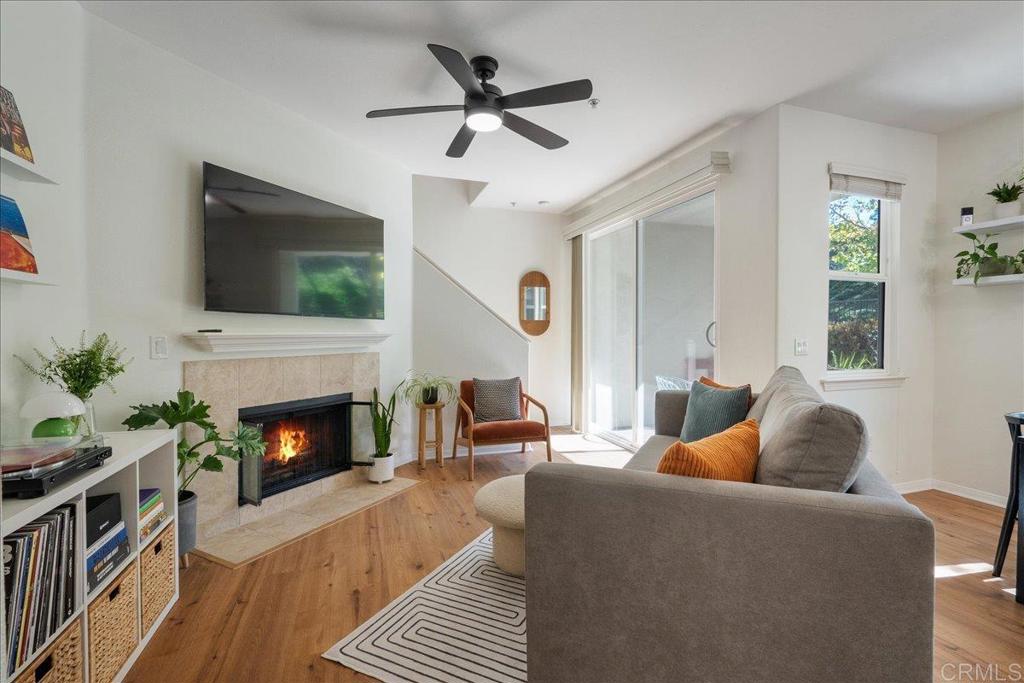 Welcome to the desirable move-in ready Heritage Villas community of Sabre Springs. This bright and inviting townhome features an open-concept layout that seamlessly connects the living room, dining area, kitchen, and covered private patio. Upstairs, the sizable primary suite awaits alongside a 2nd bedroom, each with its own full bathroom. Addl features include direct access to a spacious tandem 2-car garage with storage space, gas fireplace in the living room that adds a cozy ambiance, new central A/C, laundry room, new floors throughout the kitchen, living & dining room, and bedrooms. Complex features a community pool, spa, and BBQ. Convenient access to I-15 and SR-56, with close proximity to transit, shopping, and restaurants. Access to this unit is on the ground floor, with only 1 flight of stairs.