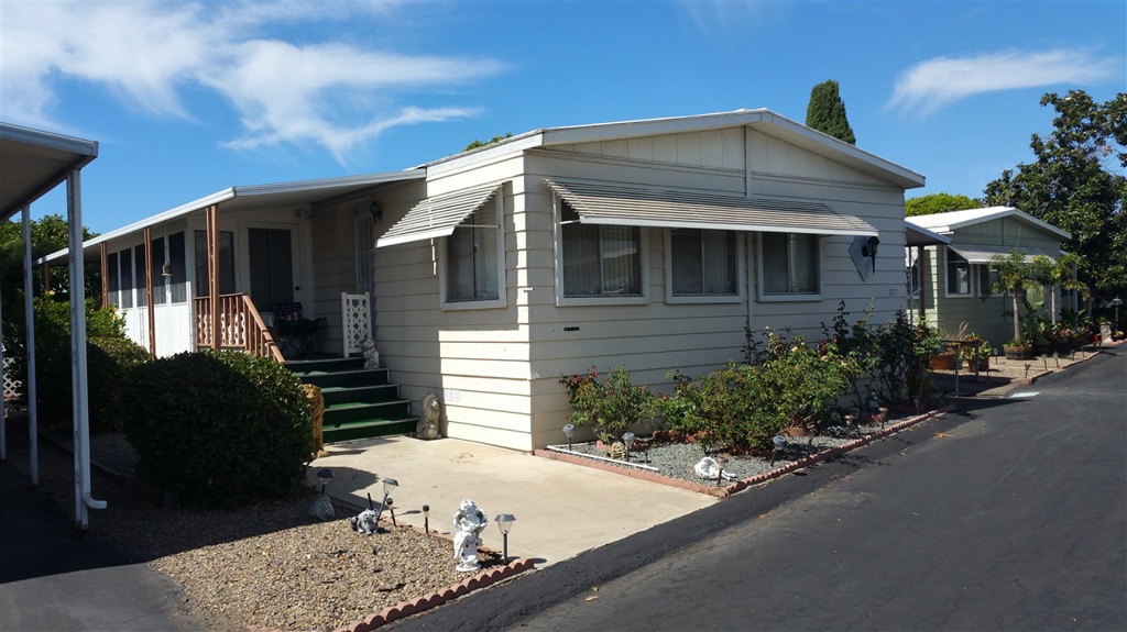 Wonderful Home, large rooms 2 bedrooms 2 baths, California room off beautiful family room, kitchen(open concept). Separate formal dinning room and large living room. Can be split into more bedrooms...Space rent $940.00 per month. To live in this park. one person must prove minimum of $2,820.00 gross income per month and have good enough credit to be park approved. Kearney Lodge is a family park located near shopping, buses, restaurants freeways beaches and much more.... Neighborhoods: Kearney Mesa Complex Features: ,, Equipment: Dryer, Washer Other Fees: 0 Sewer: Sewer Connected Topography: LL