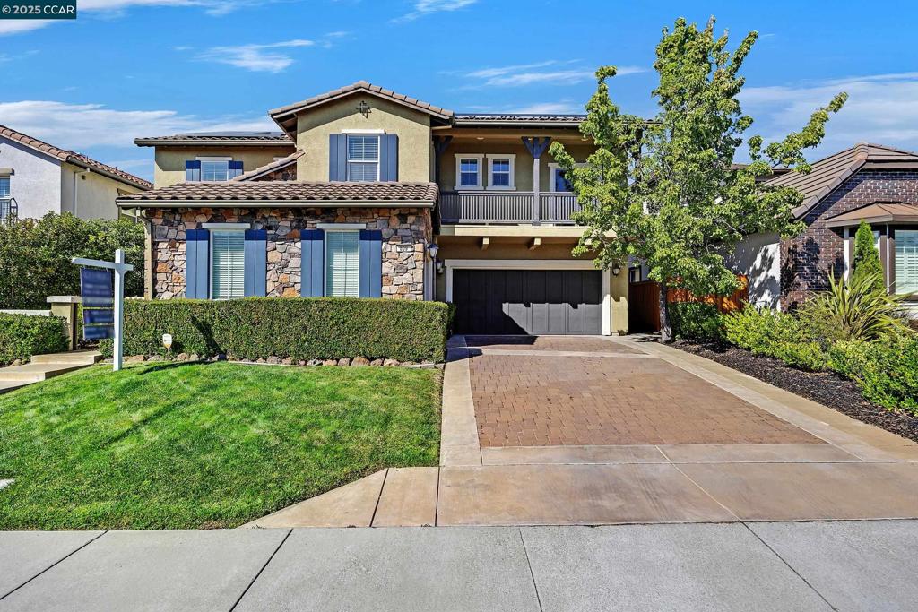 Welcome to this spacious and inviting home offering a versatile floor plan and thoughtful details throughout. Upon entry, you’re greeted by formal living and dining rooms, with a private office tucked off the foyer. The open kitchen and family room overlook the backyard, creating the perfect hub for gatherings. The kitchen features a large island with places to sit, a breakfast nook, plenty of cabinetry and stainless steel appliances. A wine cellar and convenient half bath for guests add to the main level appeal. The primary suite features soaring ceilings, a soaking tub, stall shower, dual vanities, and a walk-in closet. Upstairs you’ll find three bedrooms, including one with a Jack-and-Jill bath, plus a hall bath with double sinks and shower over tub. A bonus room and built-in hallway desks provide ideal space for work and play. The backyard is made for entertaining with a pergola-covered patio, built-in stone fireplace, and plenty of room for dining and lounging. Enjoy access to the community park and a location close to top schools.