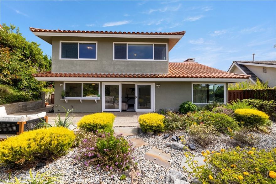 Welcome to 6935 Verde Ridge Rd, a beautifully updated residence tucked away on a serene cul-de-sac in one of Rancho Palos Verdes’ most sought-after neighborhoods. Blending privacy, comfort, and natural beauty, this home is just minutes from top-rated schools, scenic hiking trails, world-class golf, and the iconic Palos Verdes coastline.



Inside, the thoughtfully renovated primary suite showcases a spa-inspired bathroom with a spacious walk-in shower, designer tile finishes, and custom cabinetry—transforming daily routines into moments of indulgence.



Upstairs, a sunlit bedroom offers sweeping ocean views, where tranquil sunsets and refreshing sea breezes create the ultimate private retreat.



Step outside into a lushly landscaped backyard, flourishing with mature greenery and vibrant blooms. This peaceful garden oasis is perfect for entertaining, cultivating your favorite plants, or simply soaking in the California sunshine.



Beyond your doorstep, enjoy the unmatched convenience of being close to Golden Cove Plaza’s shops and dining, Terranea Resort, Trump National Golf Club, and pristine beaches—all while still being within easy reach of freeways and the greater South Bay.



With its prime location, timeless coastal charm, and modern upgrades, this home is a rare opportunity to enjoy the very best of Palos Verdes living—in comfort, beauty, and style.