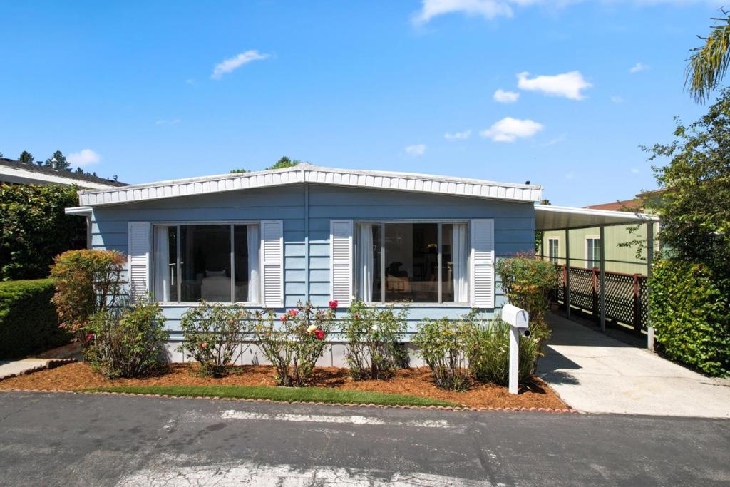 Welcome to Vista Del Lago in Scotts Valley! This bright and airy two-bedroom, two-bath home offers the perfect balance of comfort and convenience. Ideally situated with easy access to Highway 17, youre just moments from local dining, shopping, Henry Cowell Redwoods, Glenwood Open Space Preserve, and the stunning beaches of Santa Cruz. Inside, natural light pours through oversized windows and skylights, highlighting the open floor plan designed for easy living. The primary suite includes generous closet space and a dedicated vanity, while thoughtful extras like an in-unit washer and dryer, central AC, covered parking for two, and a bonus storage shed add everyday convenience. Vista Del Lago is an all-ages park, offering residents resort-style amenities, including a heated pool, spa, clubhouse, dog park, and fitness center, perfect for both relaxation and recreation.