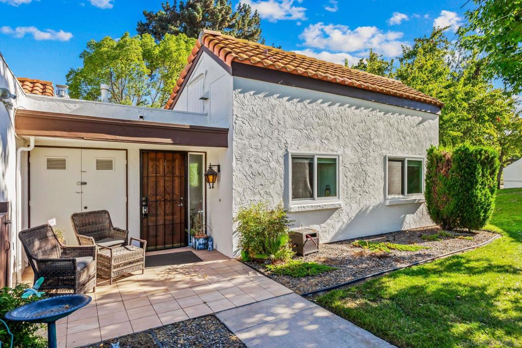 Gorgeous Single-Level End Unit in 55+ Seven Oaks! Updated 2 bed + DEN / 2 bath home in one of the best locations in the community! This quiet cul-de-sac home feels private and serene with two large patios overlooking lush greenery. Spacious open floor plan with vaulted ceilings, abundant natural light, and cozy fireplace. The remodeled kitchen features white shaker cabinets, quartz counters, and stainless-steel appliances. Dual-pane windows, custom shades, HVAC, and outside storage closet. Enjoy the resort-style amenities Seven Oaks is known for: pool, clubhouse, library, fitness center, pickleball, and more. Move-in ready and waiting for you!