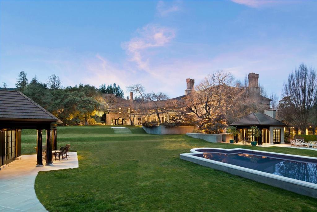 Truly a one of a kind property! Privately located in prestigious Monte Sereno. Approximately 5.6 usable acres offering total privacy & views of the Silicon Valley & surrounding mountains. The timeless elegance of home blends seamlessly w/ meticulously designed & manicured grounds. From the moment you pass through the stately gated entrance, you are transported into a world of unparalleled quality & tranquility. Exceptional architecture by renowned architect Ned Forrest, & spectacular design by top designer Paul Wiseman w/ thoughtful attention to every detail & master craftsmanship throughout. Accompanied by superior hand-selected materials, antique accouterments, & cutting edge amenities. 2000SF Great Rm, drawing rim & formal dining. Study w/ fireplace, home gym w/ sauna & steam. Fully appointed apartment as well as 2-bedrm guest house. Property features orchard, rose gardens, knot gardens, topiary, bass pond & maze. Barn & motor court. One of the most premier homes in Silicon Valley.
