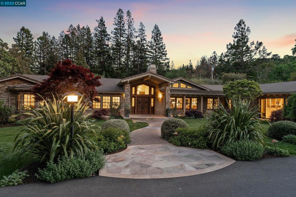 This sprawling one-of-a-kind estate boasts approximately 6,360 sq.ft. and has been beautifully and meticulously reimagined with the finest quality, materials, and attention to detail. Enjoy the modern and casual sophistication where soaring ceilings create a light, airy and open feel, state of the art chef’s kitchen with top of the line stainless steel appliances, wide plank European oak and fossil stone floors throughout. Situated on a flat 2.35 acre lot, this spectacular home enjoys single level living with a primary suite retreat, four en-suite bedrooms, executive office, a detached 1 bedroom, 1 bath guest house, oversized inviting outdoor covered cabana overlooking pool, spa and luscious grounds, a craft room, and large upgraded pool bath. Passionately and thoughtfully landscaped with mature fruit trees, tennis court, outdoor bbq kitchenette, professional lighting, and a welcoming fire pit area. Take a stroll under the wisteria covered walkway to the babbling creek that lines the back of this gorgeous private property. Located in the prestigious Happy Valley neighborhood, close proximity to downtown, commute, and top-rated Lafayette schools. This rare and unparalleled property strikes a balance of perfect harmony, grace, and excellence.
