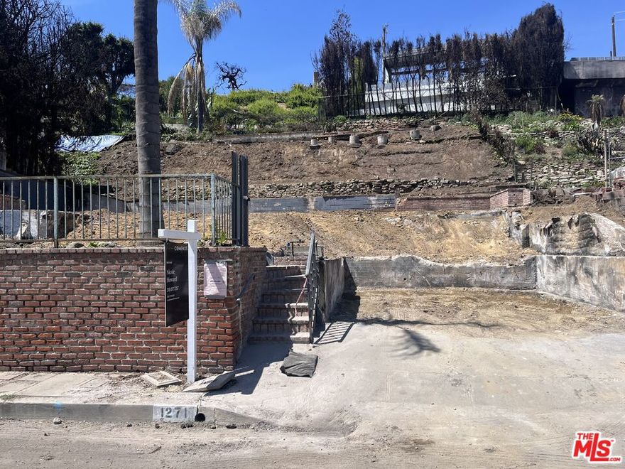 Opportunity to build in this highly sought after neighborhood, located between the mountains and the sea. Solid view potential! This is an opportunity to build what you'd like AND be expedited too!  Lot has cleared phase 2 debris.  Great view potential and ideally located blocks from Palisades Village, parks and local coffee shops.  This is an exceptional opportunity to get into this very special community.