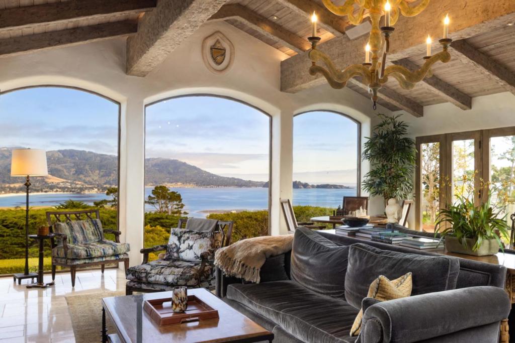 Early California Spanish Style Estate, Perfected for Modern Living. Bella Vista is one of the original great Pebble Beach estates perched atop legendary Strawberry Hill and is amongst the sunniest, private & most coveted locations. This gated, park-like 2.6 acres boasts prolific gardens, mature landscaping & jaw dropping panoramic views. Renovated & perfected for modern living, this compound enjoys an 8,500+ sq ft main house, 2 bedroom guest house & studio carriage house. Enjoy elegant living with extraordinary entertaining spaces, hot tub with stunning views, sport court, bocce ball, putting green, sprawling terraces with outdoor fireplace & 2 firepits. Inside a gourmet chefs kitchen, formal dining room, elegant family room with huge ocean views, bar/billiards room & 1,500 bottle wine cellar & tasting room. This estate provides the perfect combination of luxury & elegance with intimate & large scale entertaining spaces to be enjoyed for generations to come. A legacy home in one of the most beautiful locations in the world.