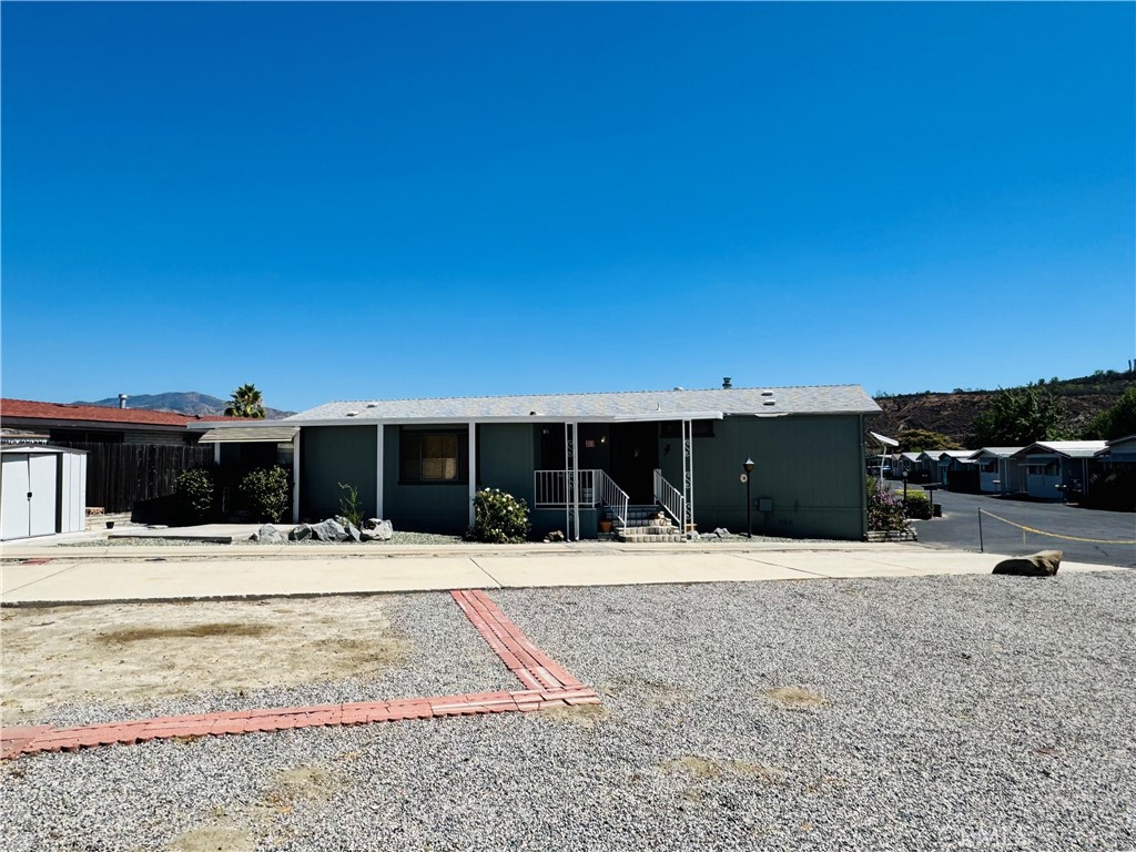 Welcome to Vista De Oro Mobile Home Park, a peaceful all-ages community in Hemet’s Valle Vista neighborhood at 45521 State Highway 74. The park offers resort-style amenities, including a clubhouse with a kitchen and banquet room, pool and spa, billiards, a library, laundry facilities, RV storage, and guest parking all set within a well kept neighborhood.
This spacious 2 bedroom mobile home features a new roof, a bright and open floor plan, and an inviting sunroom for relaxing or entertaining. The property includes a covered carport with parking for two vehicles and a separate laundry area for added convenience.
Located close to parks, shopping, and schools, this home offers comfort and convenience at an affordable price.