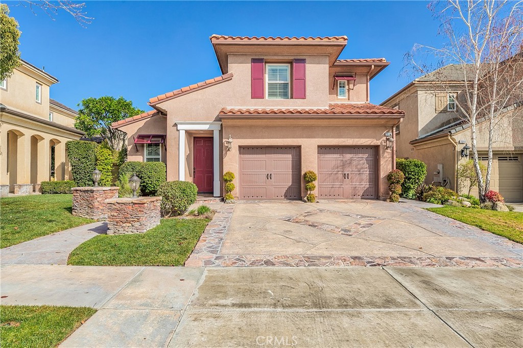 Come and see this stunning 5 bedroom home (1 bedroom downstairs) in the gated Westridge community! Some of the great features of this home include: Updated flooring throughout, Newly upgraded kitchen with quartz countertops, Family room with built-in entertainment center and fireplace, Dining room with chandelier, Gorgeous bathrooms throughout the home, Spacious master bedroom and bathroom with walk-in closet, Upstairs laundry, 2 car garage with epoxy flooring, Great backyard with string lights to enjoy beautiful Santa Clarita evenings and so much more! This will be a great place to call home!