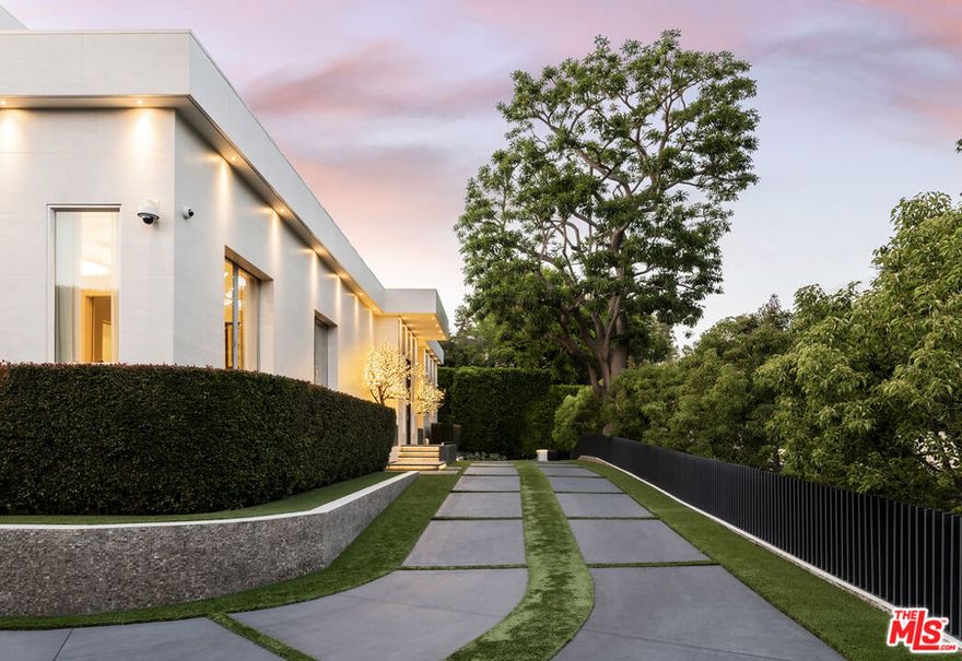 Take a one-minute trip from the iconic Beverly Hills Hotel and arrive at this private modern estate tucked behind gates and mature landscaping in the best location in Beverly Hills. Offering 12,664 SF of air-conditioned space and a total of 16,646 SF under roof on an expansive 28,747 SF lot, this extremely well-built, stylish, and masterfully designed compound features a flawless floor plan with 9 bedrooms and 13 bathrooms. Being sold by its only owner since completion, the estate offers the highest level of accommodation for the high-end future owner. Designed with high ceilings on all levels and beautiful walls for the sophisticated art collector, the feel of home and the sense of an exciting vacation blur the line.  The main floor boasts a sizable kitchen with a giant island that includes seating, opening to a family room with a beautiful staircase. Just around the corner, a living room with a bar, an oversized elevator, a cozy spacious den and an office with a private meeting room that all spill out to the spectacular hotel-like covered patio and grounds, complete with a sparkling swimmer's pool, spa, waterfall, fire pit lounge, barbecue kitchen under a steel pergola and a basketball area. The second floor features a luxurious primary suite with dual baths and walk-in closets and an oversized covered deck overlooking the pool along with three additional second-floor suites. There are also two suites on the main floor (one with a private entrance) and three detached casitas (two connecting with a receding sliding door) to complete the total of nine bedroom suites on the compound. Super inviting and high ceiling basement level with an expansive and fabulously appointed theater with receding blackout wall opening to a large game room, bar and temperature-controlled wine room.  Subterranean garage for 8-plus cars with easy access for sports cars along with a dual-gated drive-thru motor court wrapping the property in endless parking onsite, perfect for entertaining flow.  Indooroutdoor California living at its finest with complete serenity yet immediate access to the world's finest shops, restaurants, hotels, and spas.