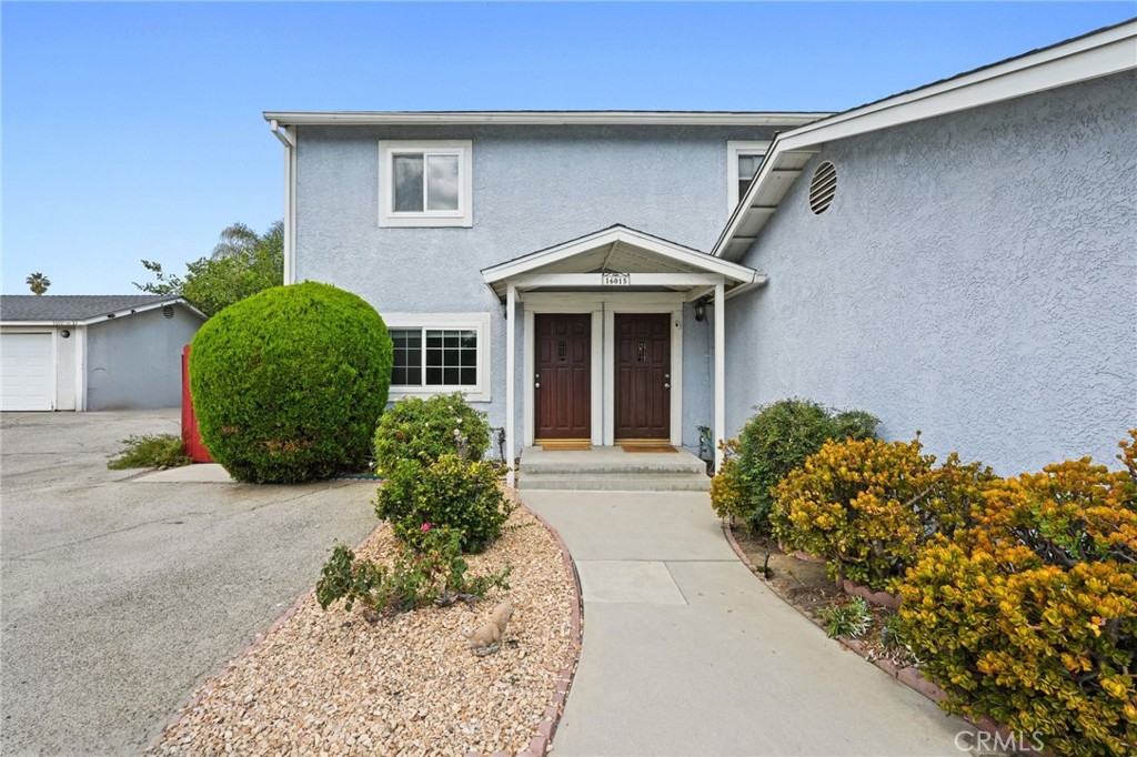 Spacious, two-story 2 bed+1.5 bath duplex located on private cul-de-sac in desirable Lake Balboa. Light and bright with laminate floors throughout. Open kitchen/dining area that leads out to a spacious patio - perfect for outdoor dining. Half bath downstairs, with full bath and 2 bedrooms located upstairs. Home also features washer & dryer in-unit, central heat & air, and private 2 car garage. Water & gardener included. Inquire about pets. Convenient to the 405 freeway, Lake Balboa Park, Van Nuys Fly Away, and much more.