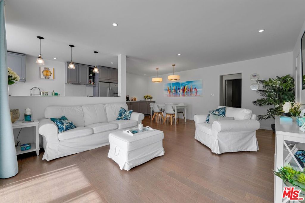 This gorgeous 2-bedroom condo with blends classic Melrose Place vibes with modern-day comfort and style. Bright, airy, and beautifully laid out, this home is ideal as a full-time residence or a stylish pied--terre in one of LA's most coveted neighborhoods. Inside, you will find an inviting floor plan featuring a gourmet kitchen with premium finishes -- perfect for anyone who loves to cook or entertain. The spacious living area opens to a large private patio, creating the perfect indoor-outdoor flow for morning coffee or evening gatherings under the stars. Enjoy the peace and privacy of gated, secured parking and entry, plus access to a serene pool area that's rarely used: your own hidden oasis in the city. Located in prime West Hollywood, you're just moments away from the best shopping, dining, and nightlife the city has to offer: think Laurel Hardware, Ysabel, Whole Foods, theaters, and more! Furniture may be negotiable, making this stunning condo a truly turnkey opportunity.