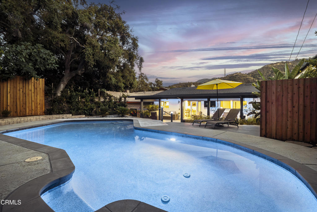 Imagine finding a home where you can simply bring your toothbrush and settle in. This single-level La Crescenta home has been beautifully renovated after being loved by the same family for years. A blend of modern style with smart-home technology for truly effortless living. The open floor plan flows to a sunken living room with sleek fireplace, Milgard dual-pane windows, and motorized shades, while French doors open to a private backyard retreat with Alumawood-covered patio, pool, and spa that feel like your own resort.Whether you're starting fresh after deciding not to rebuild, looking for a family-friendly home just five houses from Crescenta Valley Park, or ready to downsize and enjoy single-level living , this home delivers. The seller is willing to negotiate a turnkey package--including furniture, dishes, and even silverware--making it possible to move in and start enjoying the best of La Crescenta living right away.Located just five houses from Crescenta Valley Park, you're minutes away from the children's play area, scenic hiking trails, and a skate park. On the park's west side, discover the Crescenta Valley Dog Park--an ideal outing for pet owners. Nearby schools, neighborhood cafes, and local favorites in Montrose, Glendale & Pasadena put the best of the Foothills within easy reach.Don't miss your chance to own a lifestyle-ready home in one of La Crescenta's most sought-after neighborhoods.