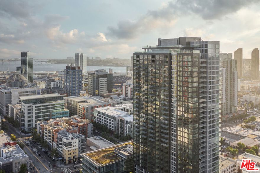 Spanning The Merian's 33rd and 34th floors, and offering the most spectacular views of both the bay and downtown San Diego The Merian Penthouse Collection introduces an unparalleled living experience presenting a new theory of luxury living, comfort, and sophistication in the heart of downtown San Diego's East Village neighborhood. This unique collection of thoughtfully designed residences represent the pinnacle of Southern California living with dual level layouts offering spectacular views, custom designer finishes, and impeccable service and attention to detail which has never before been experienced in San Diego and which sets a new standard of luxury high rise coastal living. Penthouse 3301 offers a multi-level floor plan with floor to ceiling windows featuring breathtaking and sweeping coastal and city views and offers 3,100 sq. ft. of living space featuring 3 bedrooms with walk-in closets, 4 bathrooms, and two additional flex spaces that can be utilized for office, studio, or fitness purposes. Floor-to-ceiling windows and an expansive open kitchen and living room provide abundant light and space and penthouse features include Caesarstone countertops, panelized  Sub-Zero Refrigerator, stainless steel wolf appliances, Moen fixtures, Walk in pantry, built in wine fridge, laundry room, customized MasterSuite closet systems, and a private 750 sq. ft. terrace with a gas fire feature overlooking the entire San Diego coastline just to name a few. The Merian is a full service luxury community with a lobby Lounge & coffee bar, concierge, club Room with outdoor Lounge & BBQ, rooftop pool, spa & BBQ area, sky lounge, multi level fitness center with yoga studio, community plaza, amphitheater and terrance with an outdoor Jumbotron, pet spa, EV charging stations, and much more. Located in the East Village, you'll be surrounded with all the thrills of one of San Diego's most vibrant neighborhoods just steps away from Gaslamp District, Petco Park, Balboa Park, and the best that San Diego has to offer. Come experience a new standard, definition, and theory of luxury today at The Merian Penthouse Collection.