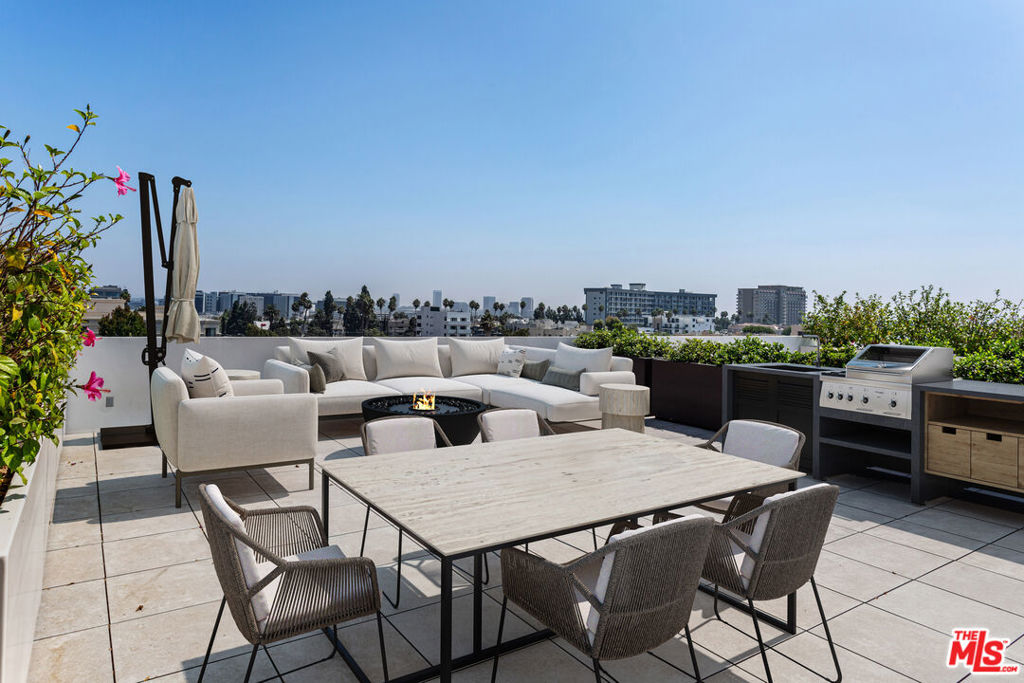 Welcome to 425 Palm in Beverly Hills, the pinnacle of elevated living. Residence 401 offers the luxury of direct elevator access into a private foyer, opening to an expansive 3-bedroom, 3.5-bathroom home with 3,411 interior SF, 111 SF patio, and 715 SF customizable rooftop deck overlooking Los Angeles. The open-concept layout flows effortlessly from the gourmet kitchen into the dining and living areas. Finishes include Wolf and Sub-Zero appliances, a built-in Miele coffee system, Caesarstone countertops, Italian Gessi fixtures, and Linea Quattro European cabinetry. Additional highlights include a dedicated laundry room and three side-by-side subterranean parking spaces. 425 Palm refines daily living with curated amenities such as a state-of-the-art fitness center, rooftop outdoor kitchen, spa, attended lobby, and secured access, all within the heart of Beverly Hills.