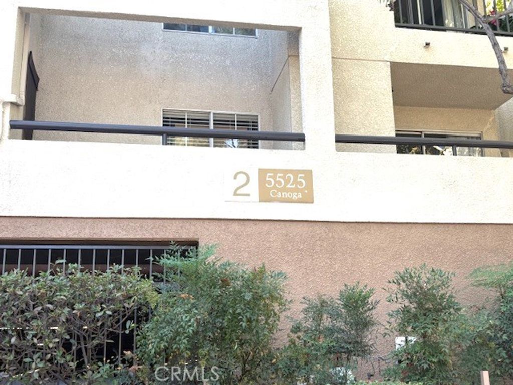 Photo of 5525 Canoga Avenue #203, Woodland Hills, CA 91367 (MLS # SR25202617)
