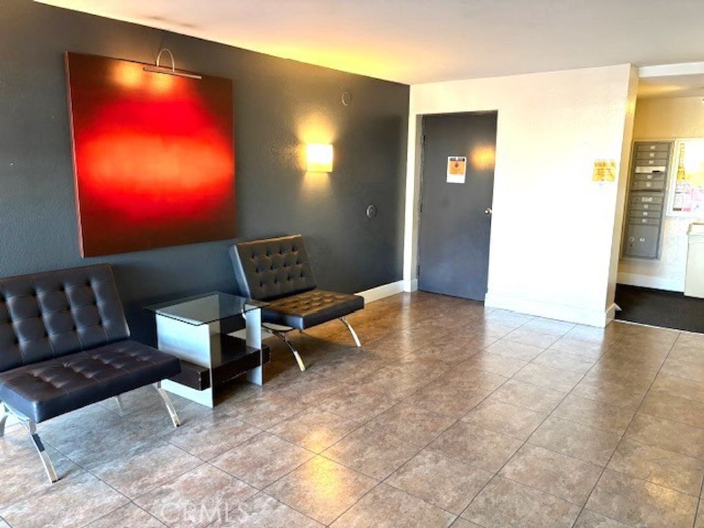 Photo of 5525 Canoga Avenue #203, Woodland Hills, CA 91367 (MLS # SR25202617)