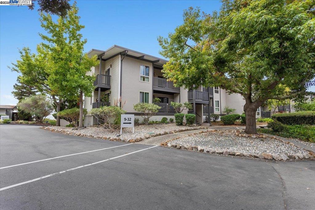Welcome to Highland Place Co-op, a true hidden gem surrounded by nature in the scenic Castro Valley hills! This beautifully upgraded upstairs unit offers 2 bedrooms, 1 bathroom, and 1,190 sq ft of stylish living space. Inside, you’ll find vaulted wood beam ceilings, luxury vinyl plank flooring, dual pane windows, central heat and AC, and an in-unit washer and dryer. The kitchen has been tastefully updated with quartz countertops, stainless steel appliances, and new cabinets. The bathroom has also been completely upgraded for a modern, fresh feel. Step outside to a newly redone balcony with panoramic bay views, plus extra storage on the balcony and a private storage unit downstairs. Highland Place is a quiet, well-maintained community with resort-style amenities including a clubhouse, swimming pool, hot tub, and tennis court. Located within the award-winning Castro Valley School District and close to Lake Chabot, freeway access, and BART, this home combines comfort, style, and convenience—East Bay living at its best!