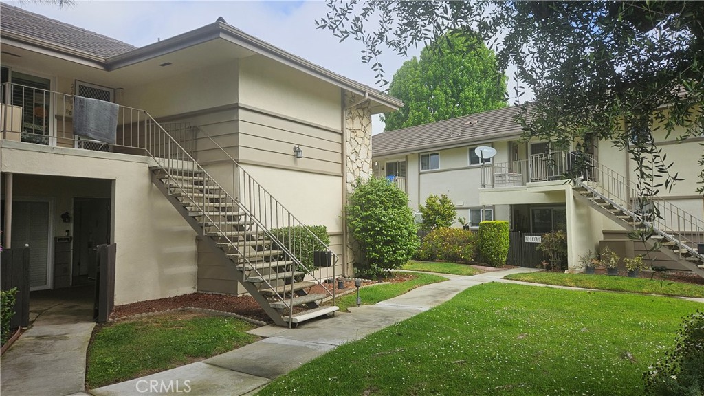 This unit is located on the West end of New Horizons. This is a sunny bright condo with green belt view and sunsets. This unit has vinyl windows and doors, new carpeting and freshly painted. The baths were updated in the past.