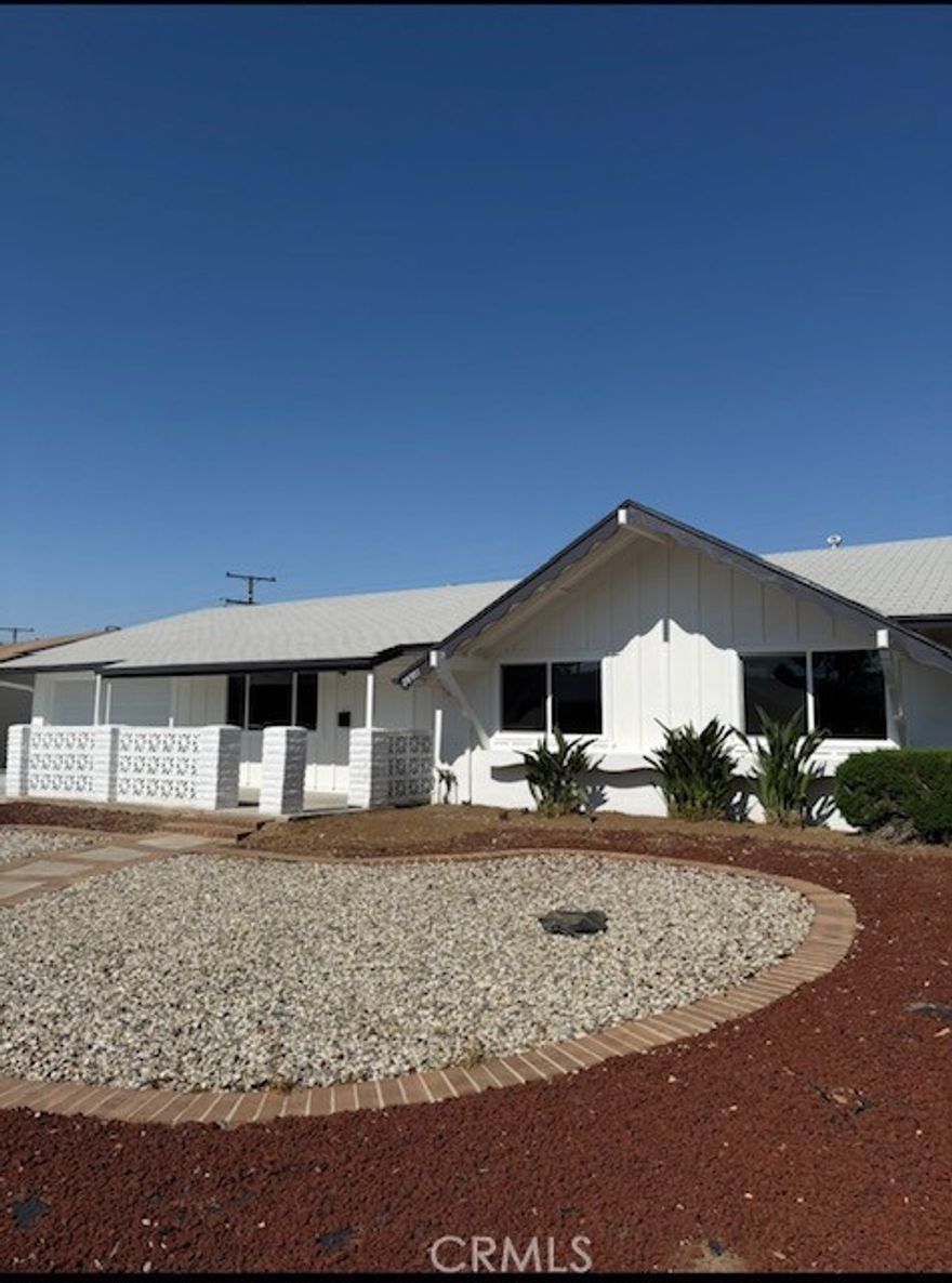 Welcome to resort-style living in the heart of Sun City! This beautifully remodeled 3 bedroom, 2 bath home is move-in ready and located on 6,970 sq ft lot in a sought-after 55 year + community. Step inside to find fresh new paint, brand new carpet and flooring throughout, and a fully updated kitchen with sleek countertops and modern finishes. Both bathrooms are in great condition, offering comfort and style. The home is light, bright, and designed for easy living. Enjoy all the perks of the HOA, including access to sparkling pools, pickleball courts, a billiards room, and more. Come see it today and fall in love with everything Sun City has to offer.