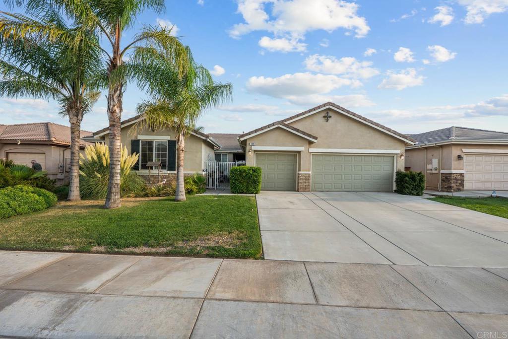 Welcome to 1489 Bottlebrush Court, a beautifully maintained single-story home located in a quiet cul-de-sac in the popular Sundance community. This home features 3 bedrooms, a flexible den that can serve as a 4th bedroom, and 2 bathrooms—perfect for families or those needing extra space. The open floor plan is bright and inviting, with plenty of natural light throughout. The kitchen offers ample cabinetry and workspace, making it functional and comfortable. Step outside to your private backyard retreat featuring a beautifully landscaped yard with a serene koi pond and a custom walk-in swimming pool. This peaceful setting is ideal for entertaining or relaxing. Additional highlights include a 3-car garage and a cemented perimeter for easy maintenance. Conveniently located near schools, parks, shopping, and dining, this home offers a perfect blend of comfort and lifestyle.